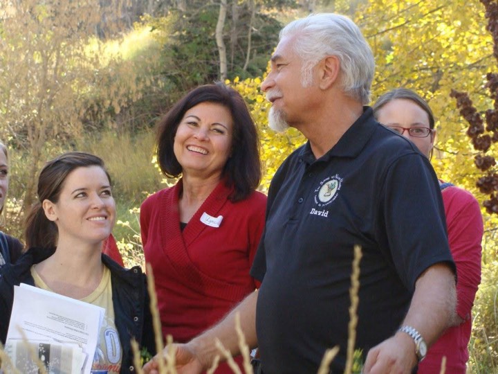 David Christopher teaching a group of students outdoors